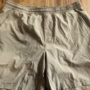 Khaki license to train lululemon shorts.  XL.  7 inch.  With liner.